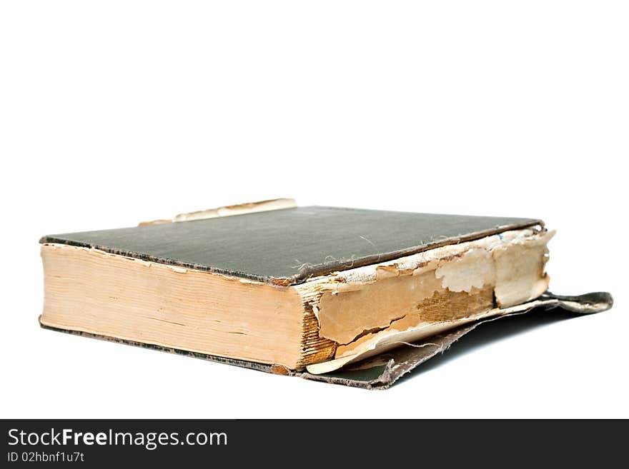 Detail of an old book isolated on white.