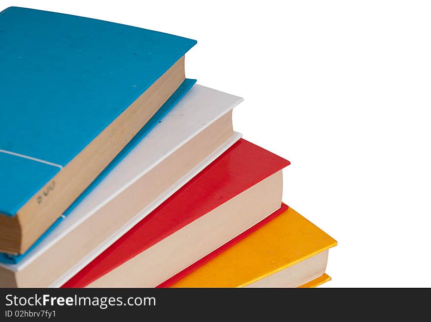 A stack of books on white background. A stack of books on white background