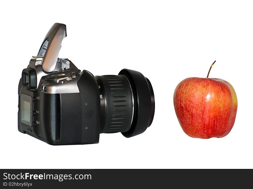 Apple close up with SLR on a background. Apple close up with SLR on a background