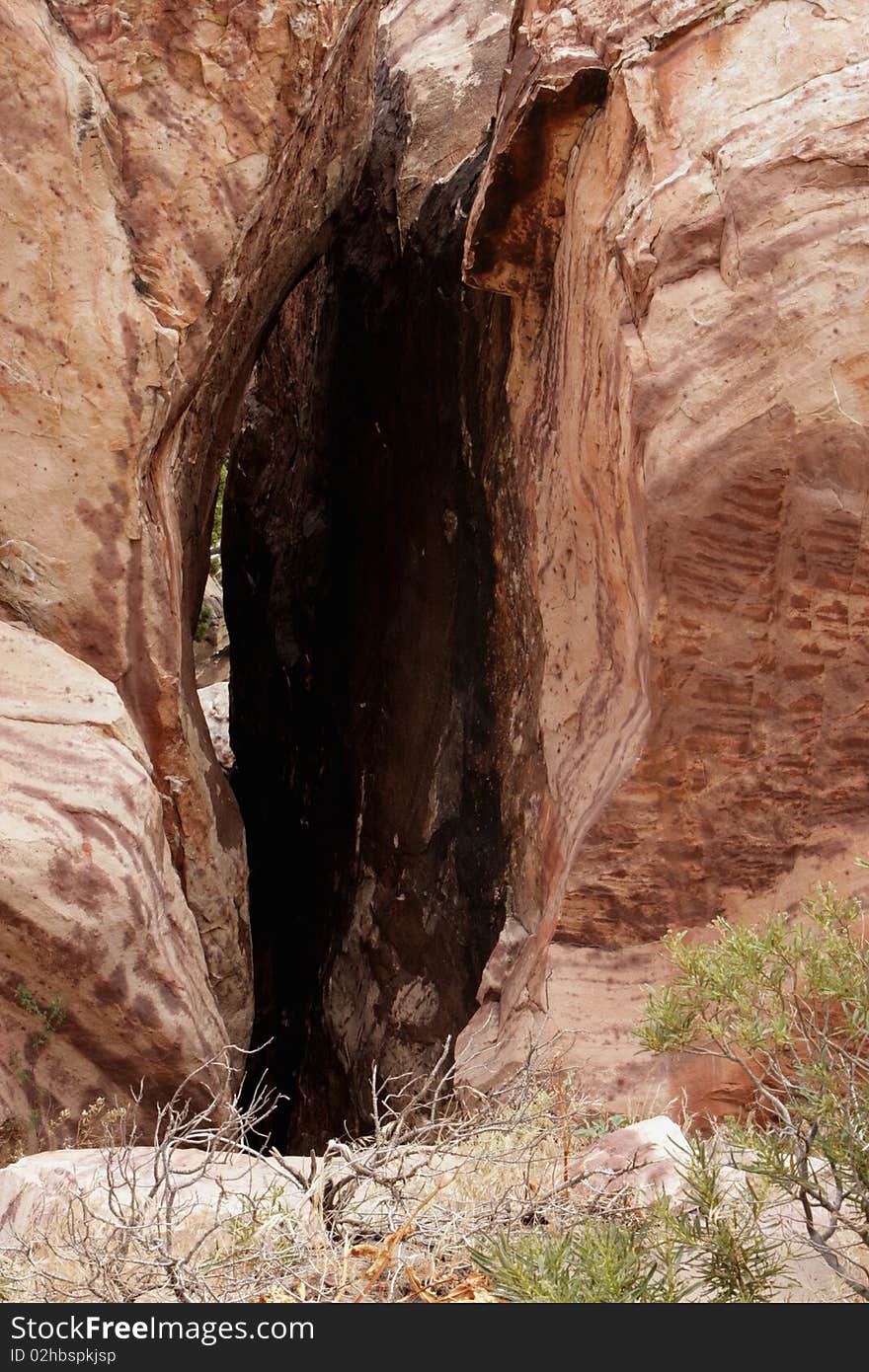 A narrow opening between a rock in Death Valley, California. A narrow opening between a rock in Death Valley, California