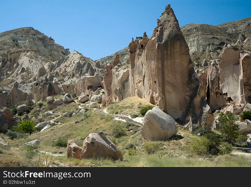 Landscape of goreme, in cappadocia,  Turkey. Cappadocia is a region of exceptional natural wonders, in particular characterized by fairy chimneys and a unique historical and cultural heritage. Landscape of goreme, in cappadocia,  Turkey. Cappadocia is a region of exceptional natural wonders, in particular characterized by fairy chimneys and a unique historical and cultural heritage.