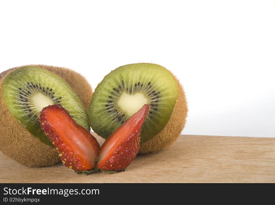 Kiwi and fresh strawberry isolated on white background