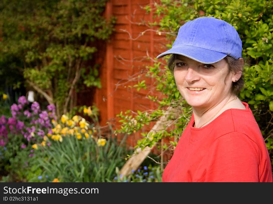 Smiling mature woman in garden