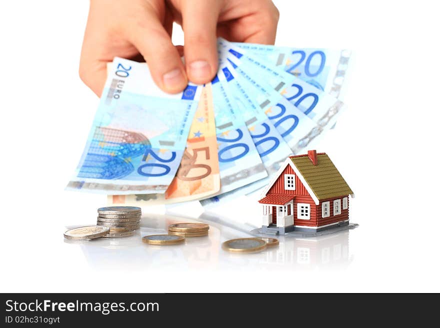 Hands with money and small house. Estate concept. Hands with money and small house. Estate concept.