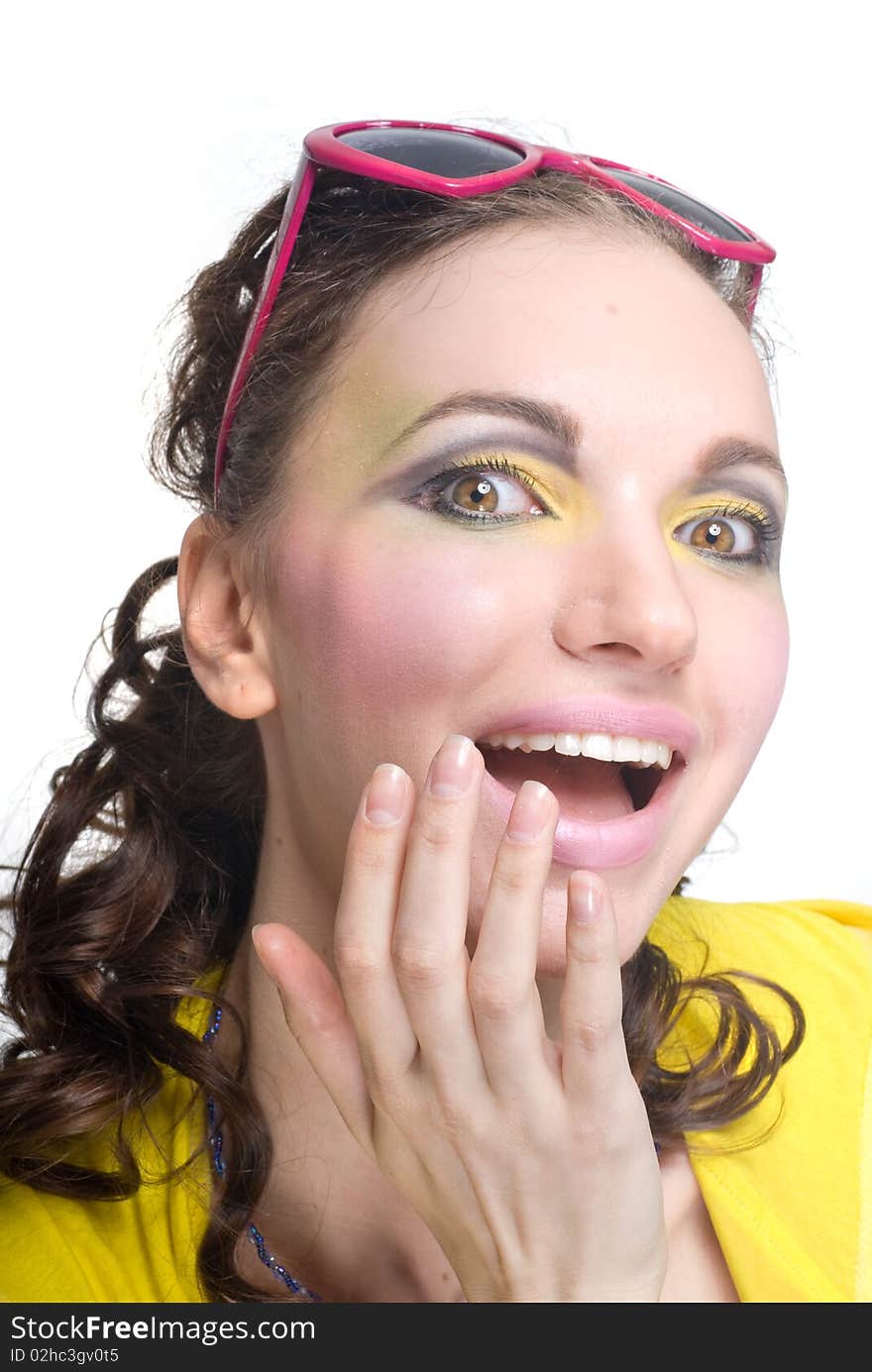 Portrait of a surprised beautiful woman on white