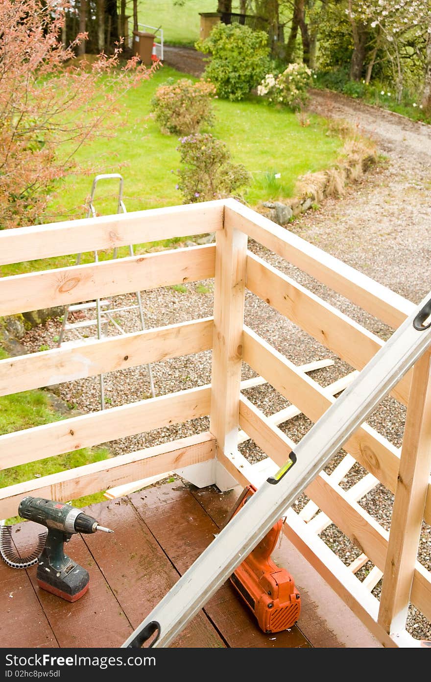 An image of the new woodwork and tools used for replacing a balcony which became dangerous because of rotten wood. An image of the new woodwork and tools used for replacing a balcony which became dangerous because of rotten wood.