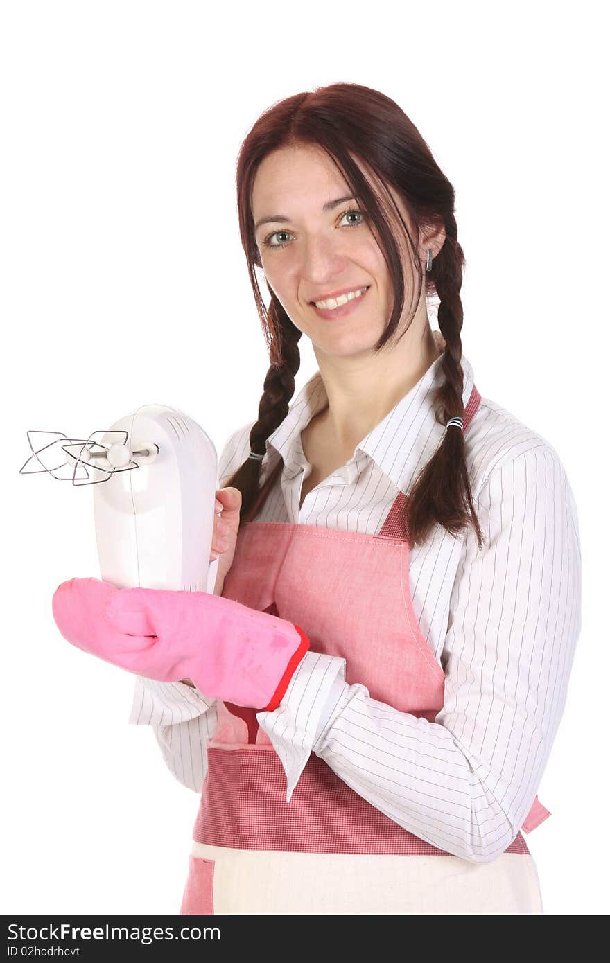 Beautiful housewife with electric beater on white background