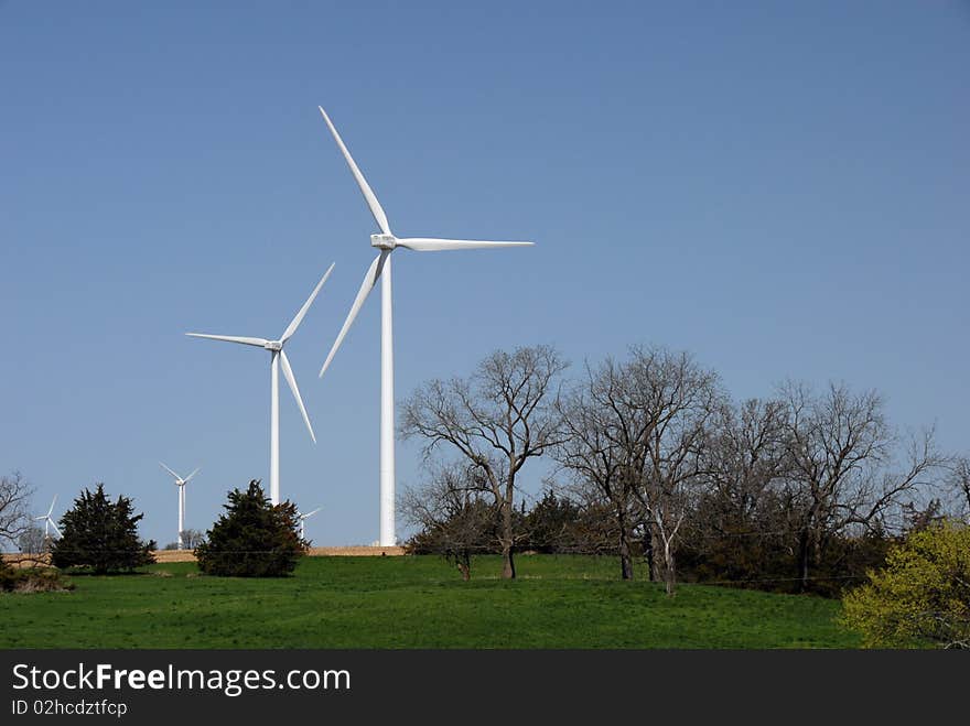 Wind powered generators above the trees