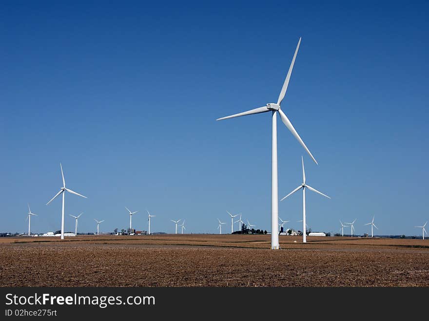 Wind powered generators in farm fields