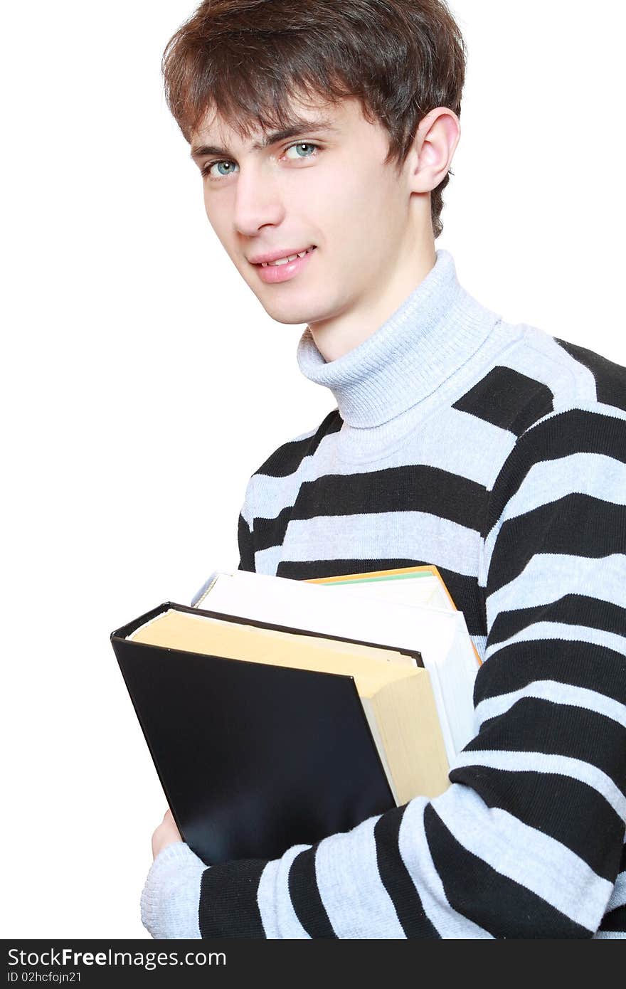 Young guy with books in hands on white background. Young guy with books in hands on white background.