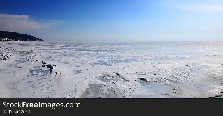 Frozen Lake Baikal. Spring. Day.