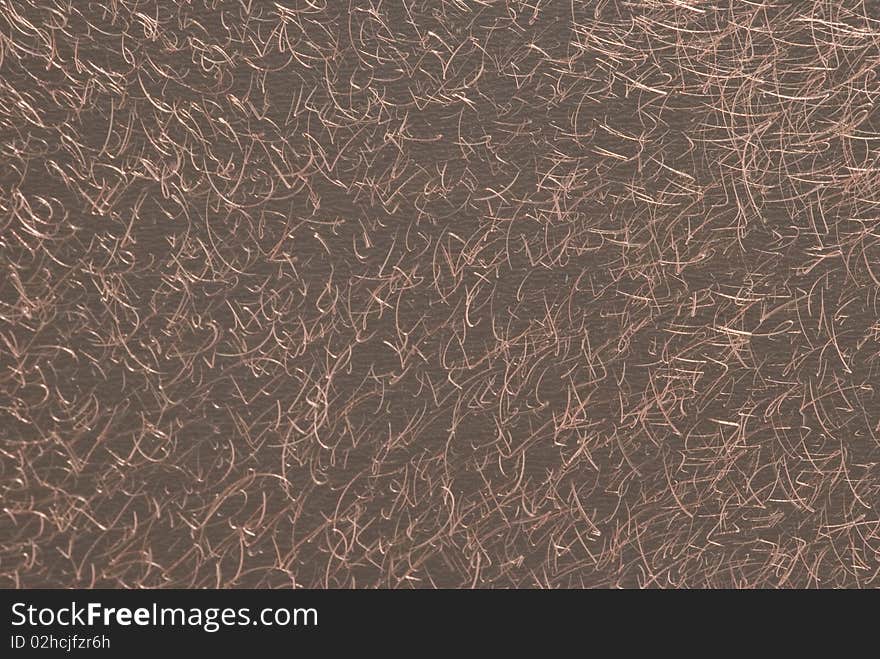 Closeup of scratched copper sheet