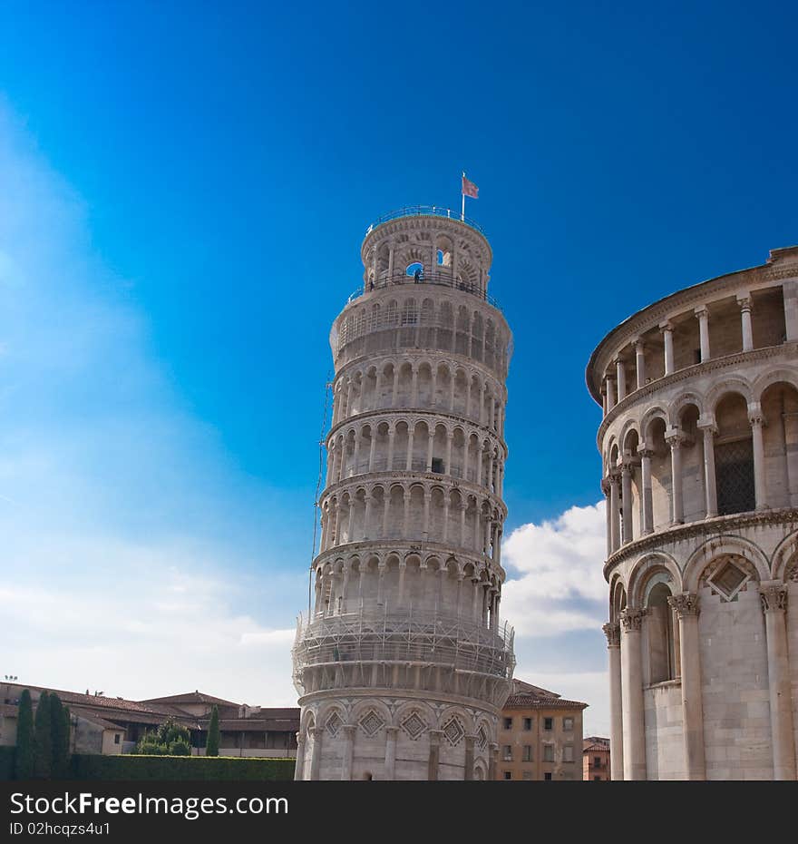 Famous Pisa tower over blue sky