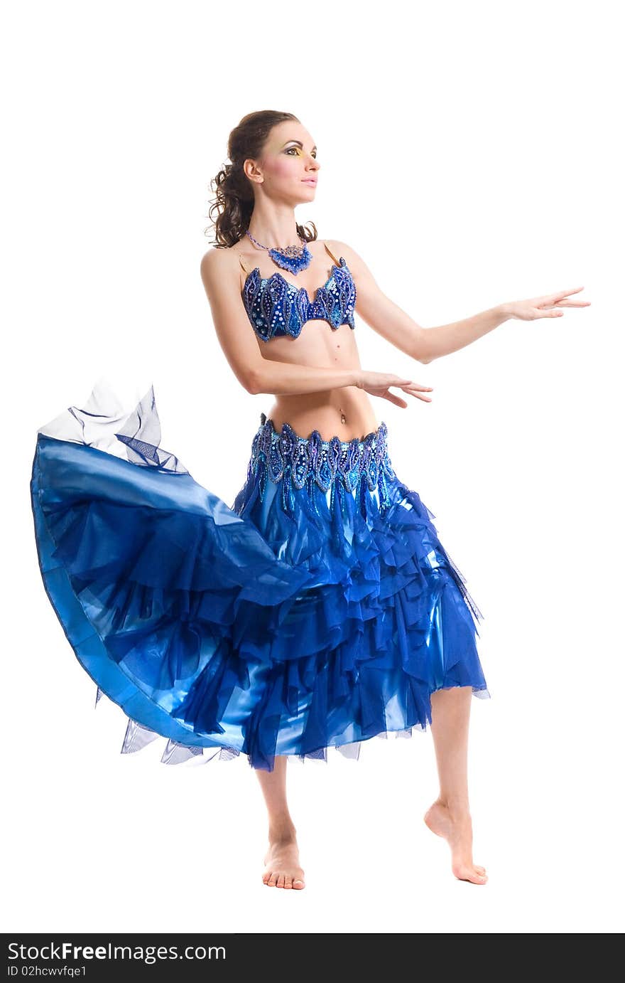 Beautiful woman dancing in blue dress