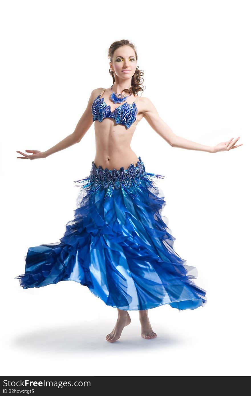 Beautiful woman dancing in blue dress