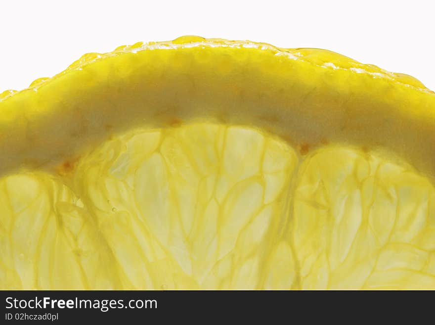 Slice of fresh juicy lemon close up. Slice of fresh juicy lemon close up