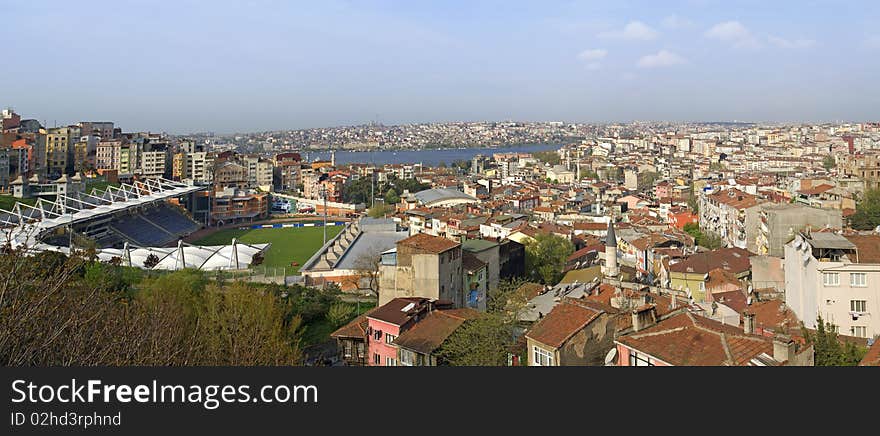 Panoramic view over a residential area of Istanbul, Turkey with a sports stadium in the foreground. Panoramic view over a residential area of Istanbul, Turkey with a sports stadium in the foreground