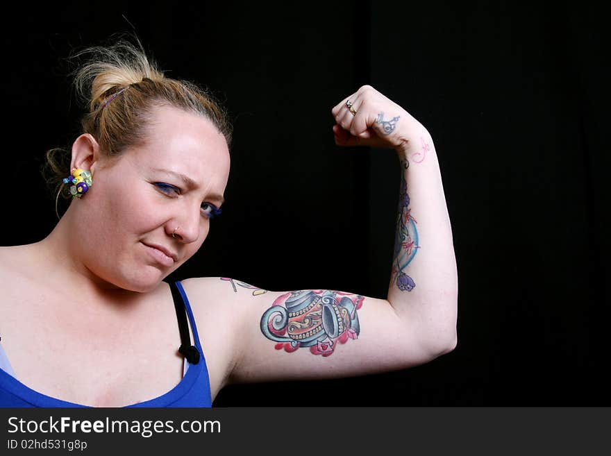 Colored girl doing arm wrestling. Colored girl doing arm wrestling