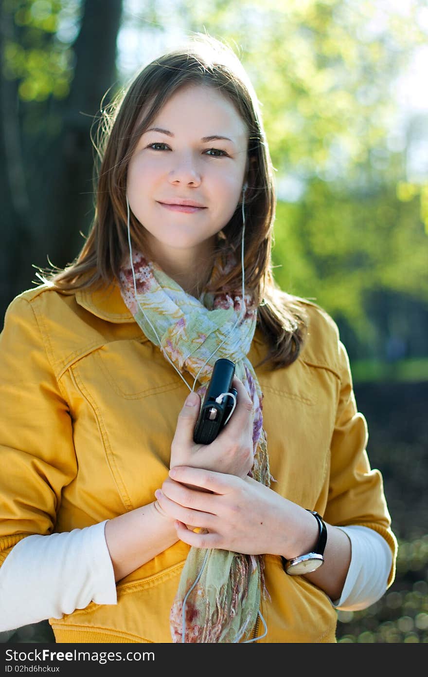 Young Woman Listnening Music