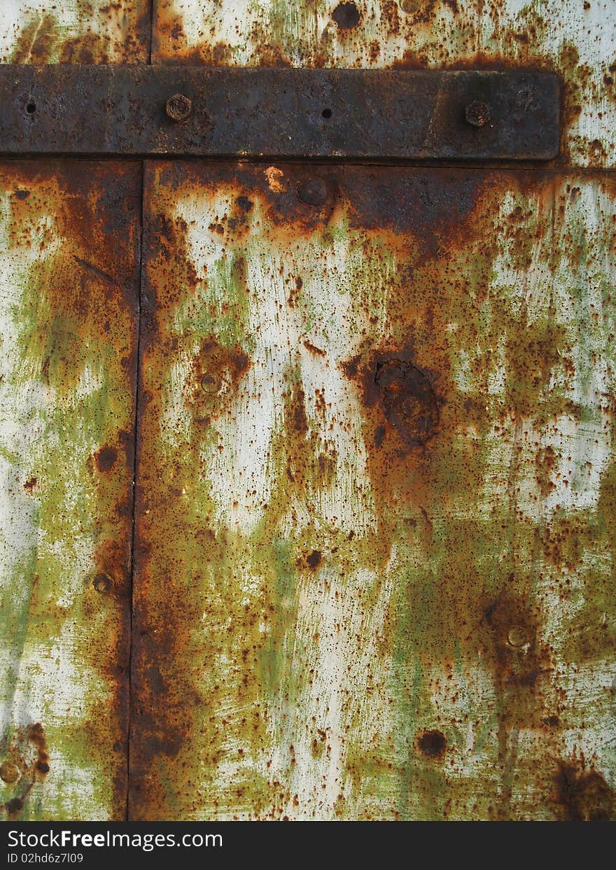 Old rusty texture on a metal door