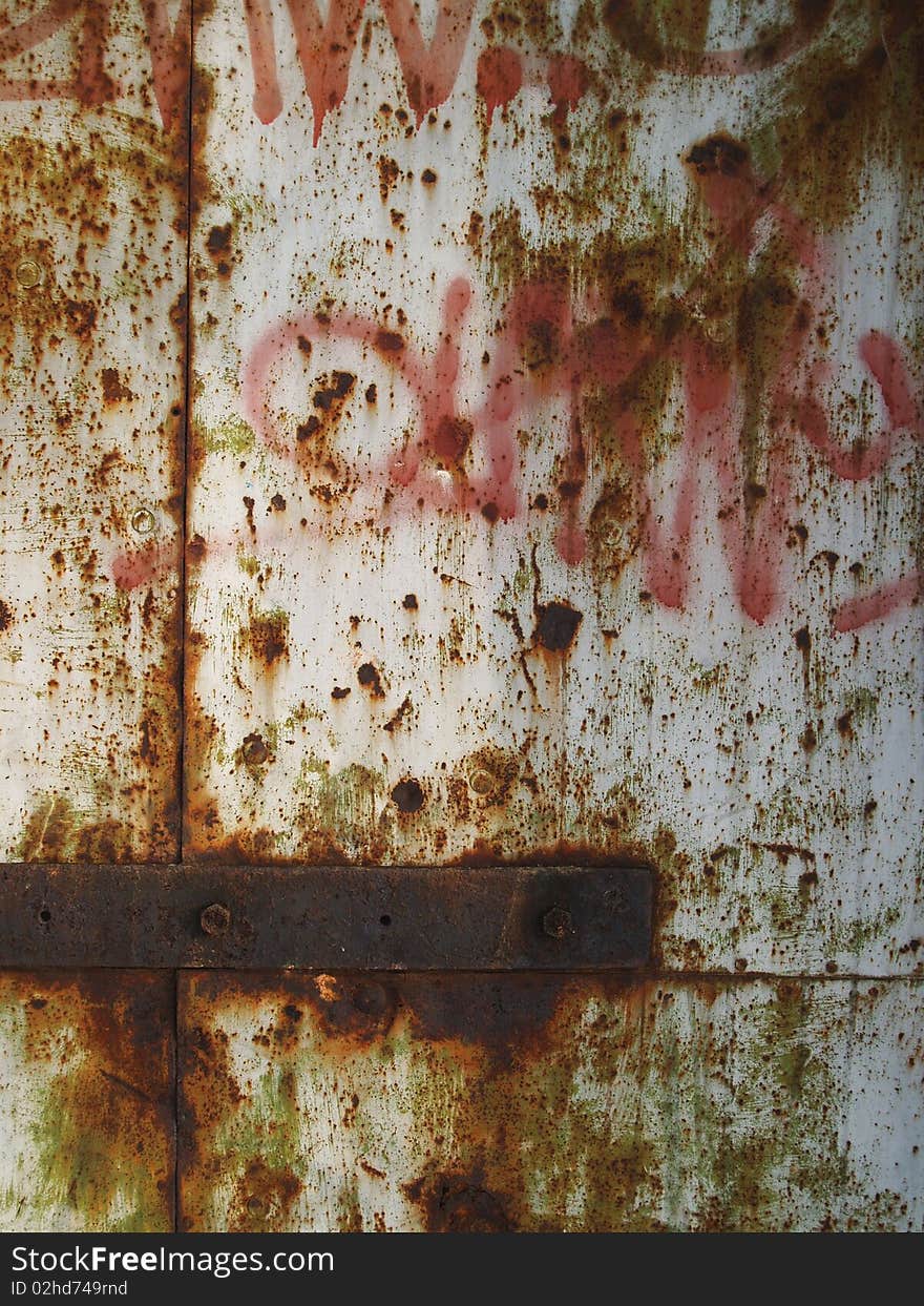 Old rusty texture on a metal door