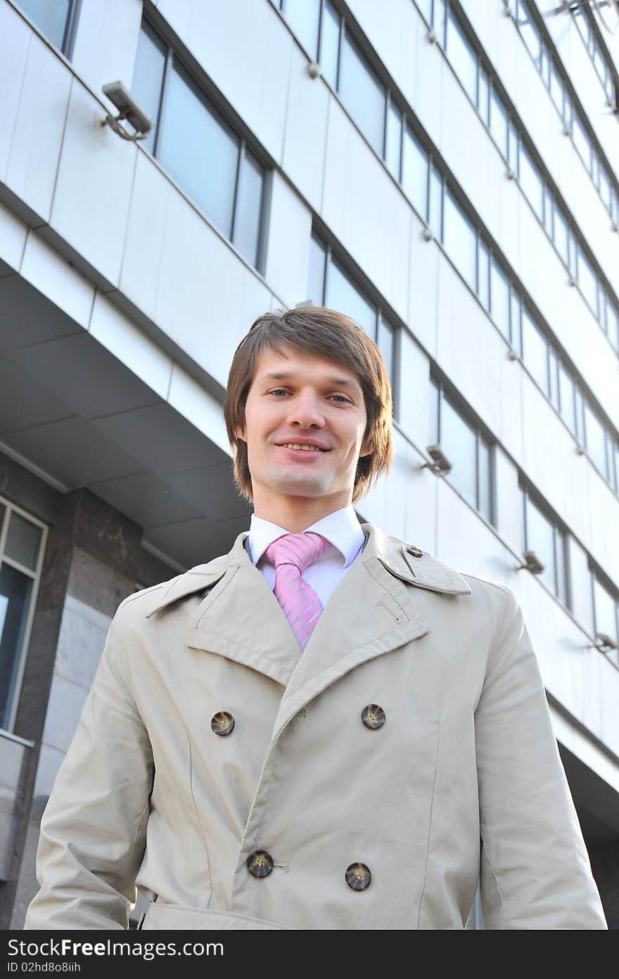 The business man in a business suit against centre business