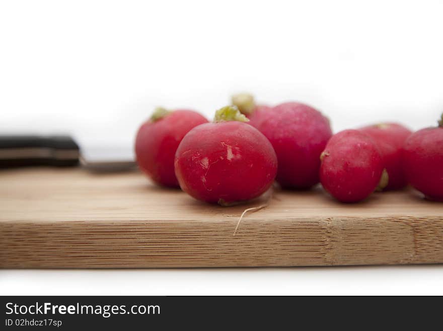 Garden radish and knife