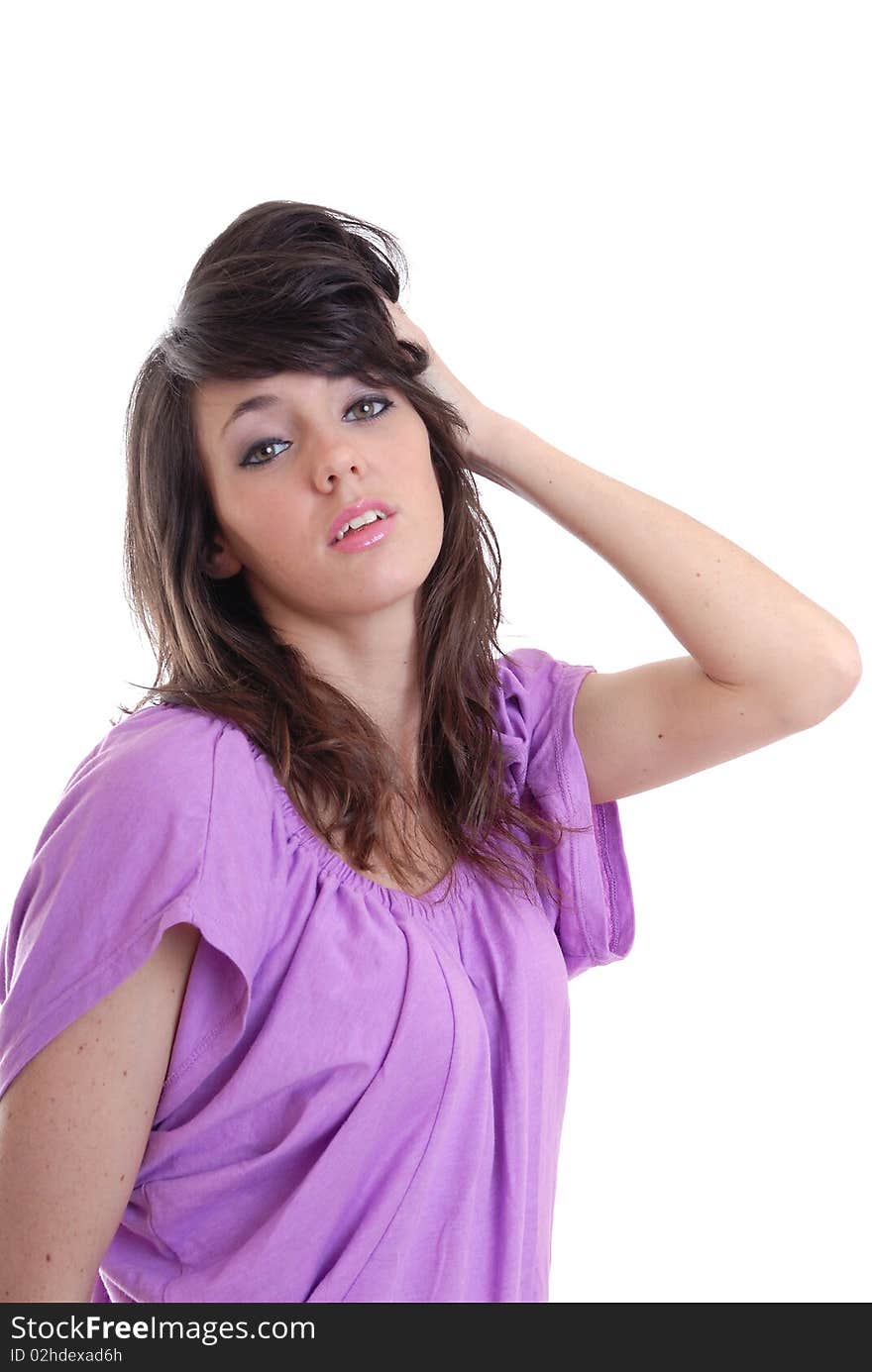 Photograph showing sexy young brunette girl isolated against white