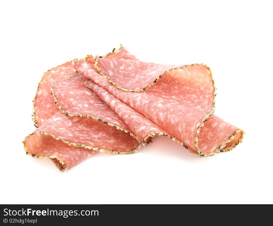 Pepper salami sausage isolated on white background