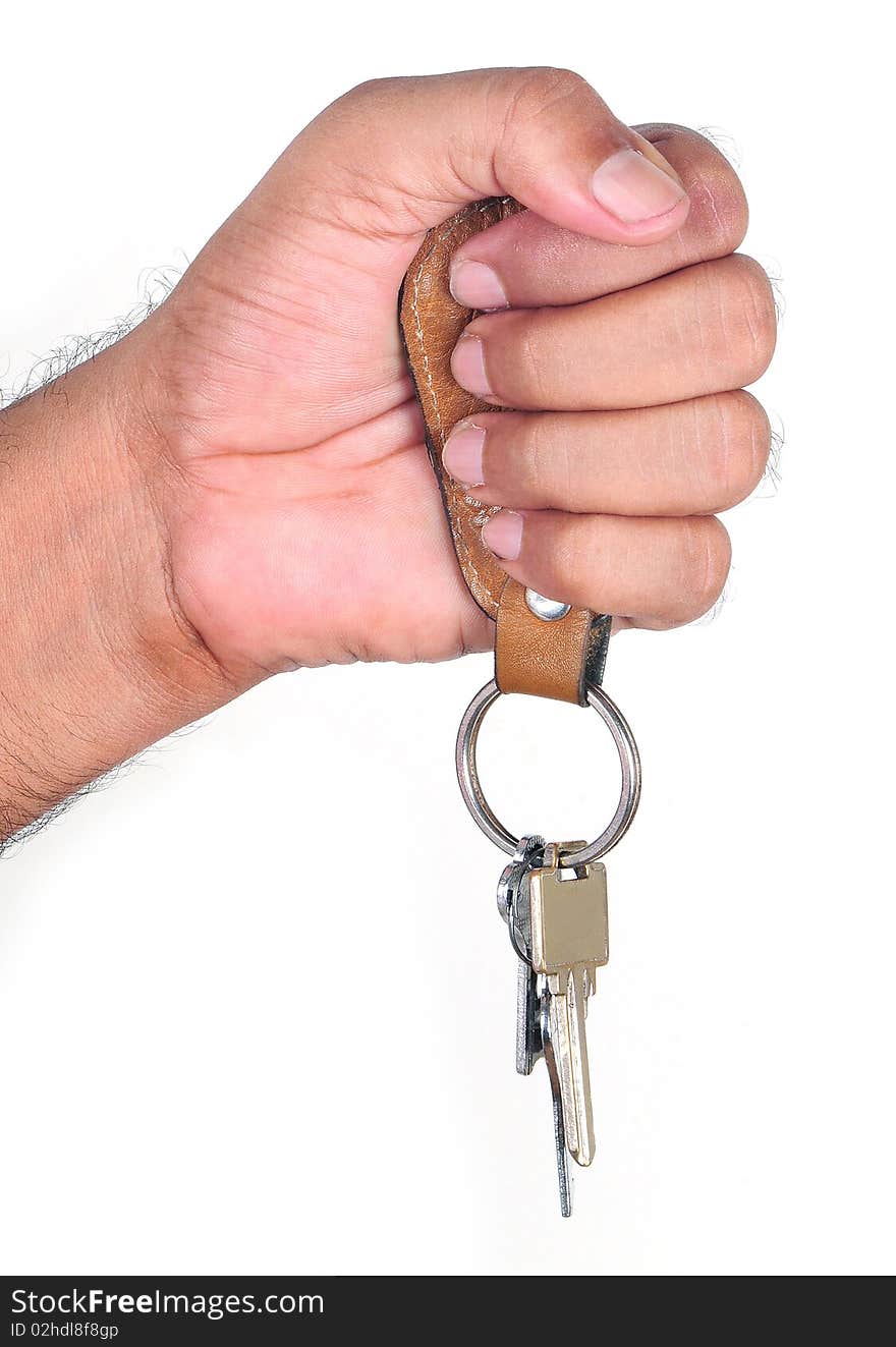 Human hand with keys on white background