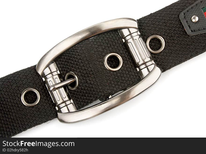 Metal buckle and black textile belt isolated on white. Metal buckle and black textile belt isolated on white