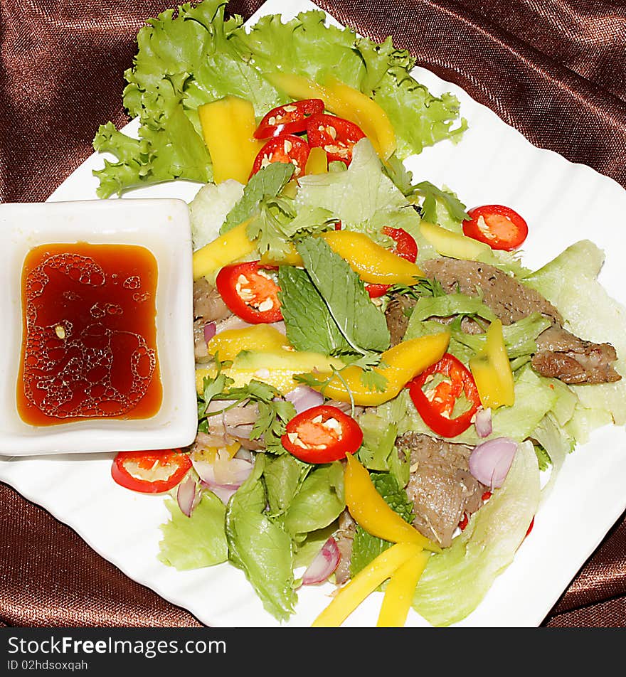 Very nice duck salad served with vegetable and hot spicy sauce. Very nice duck salad served with vegetable and hot spicy sauce