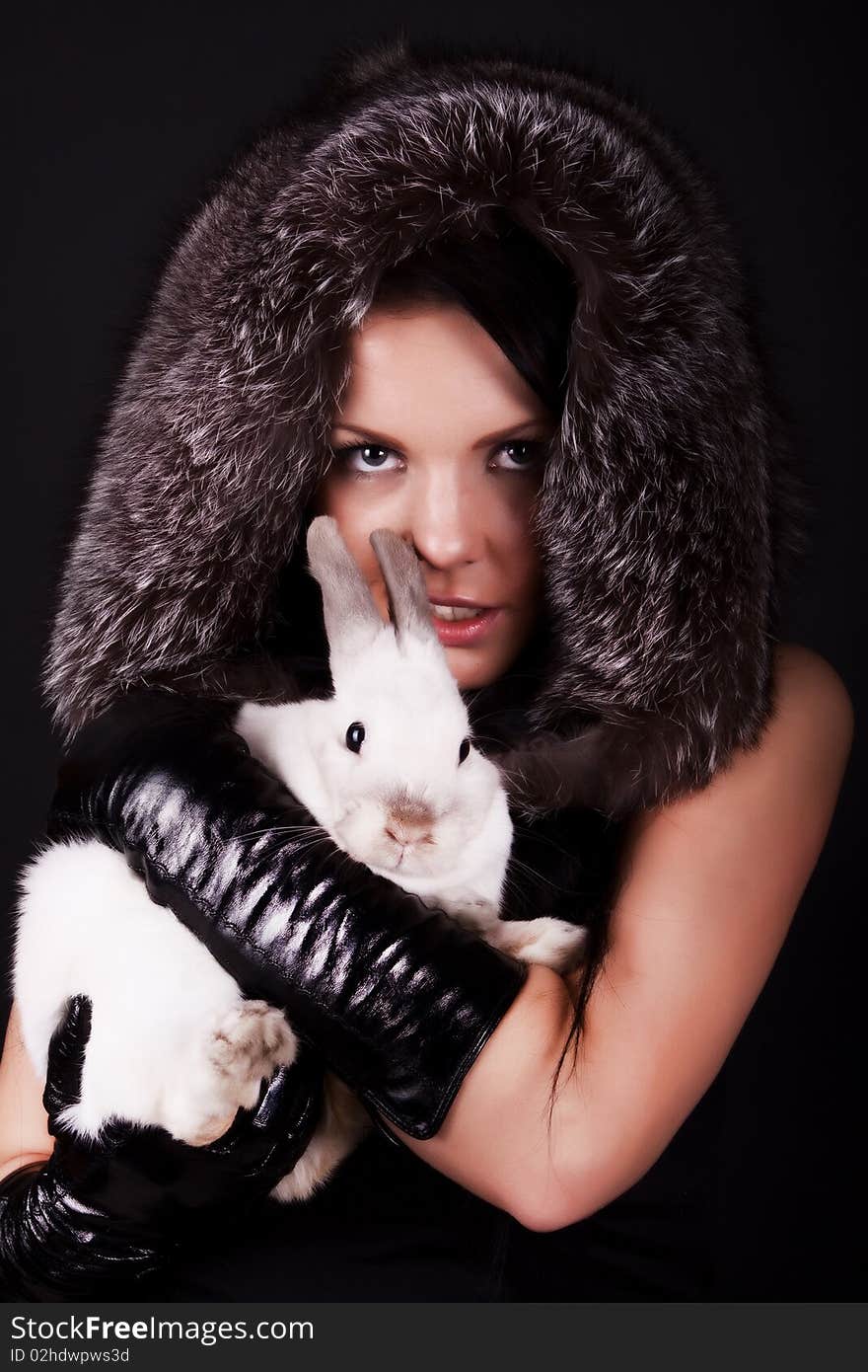 Image of stylish girl with her rabbit. Image of stylish girl with her rabbit