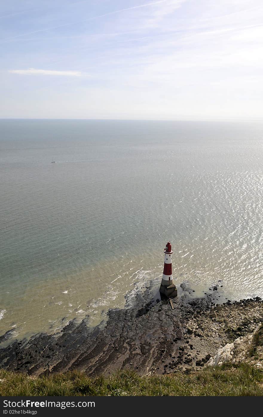 Renowned suicide spot and scenic view, the red and white lighthouse on the Sussex coast near Eastbourne. Renowned suicide spot and scenic view, the red and white lighthouse on the Sussex coast near Eastbourne