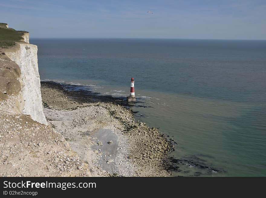 Renowned suicide spot and scenic view, the red and white lighthouse on the Sussex coast near Eastbourne. Renowned suicide spot and scenic view, the red and white lighthouse on the Sussex coast near Eastbourne