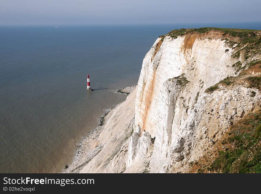 Renowned suicide spot and scenic view, the red and white lighthouse on the Sussex coast near Eastbourne. Renowned suicide spot and scenic view, the red and white lighthouse on the Sussex coast near Eastbourne