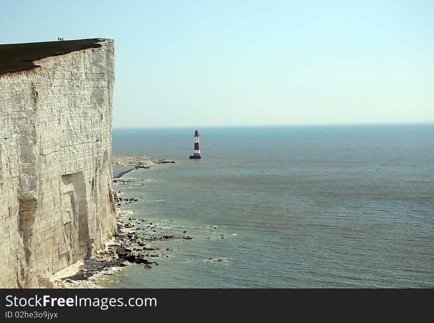 Renowned suicide spot and scenic view, the red and white lighthouse on the Sussex coast near Eastbourne. Renowned suicide spot and scenic view, the red and white lighthouse on the Sussex coast near Eastbourne