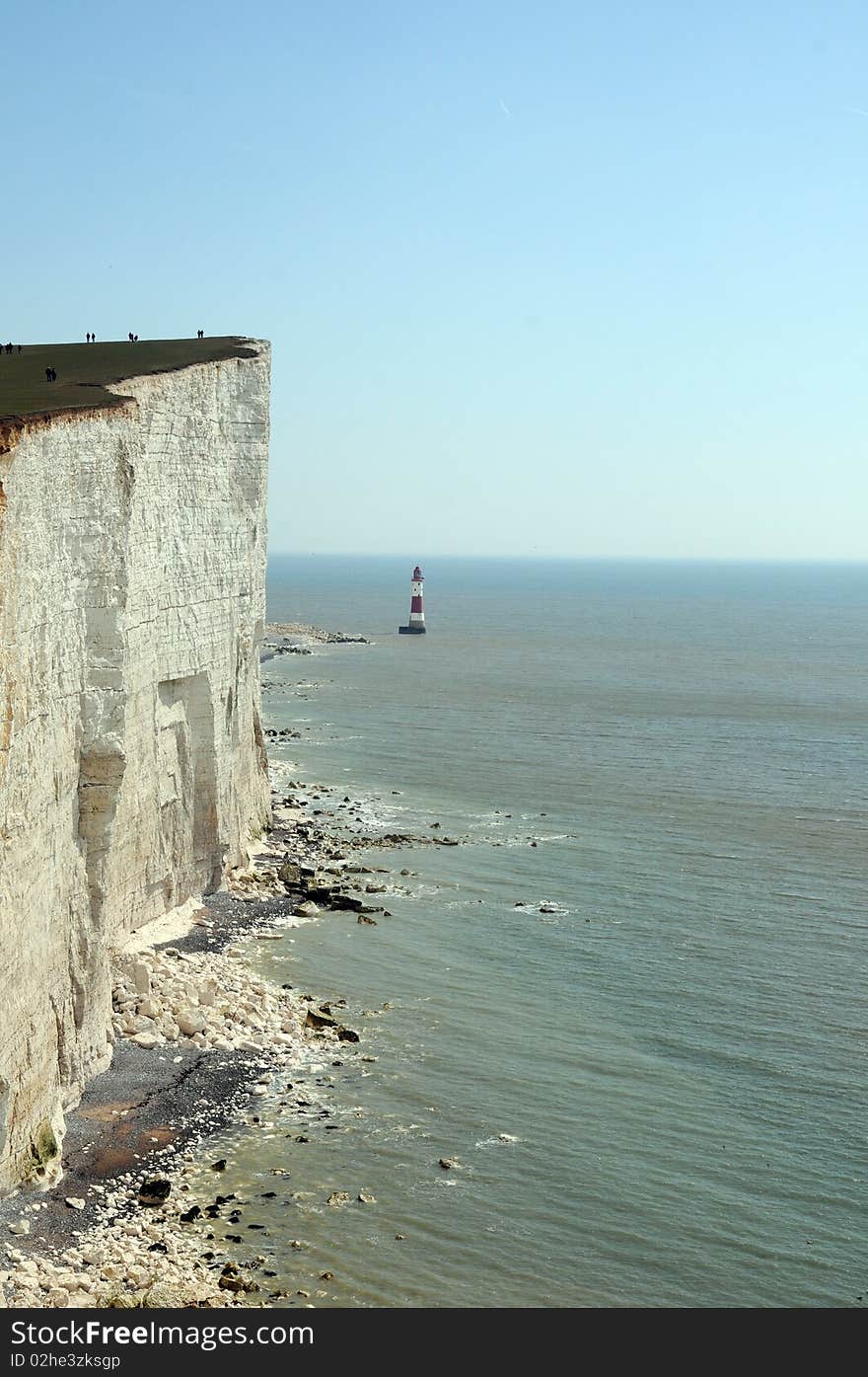 Renowned suicide spot and scenic view, the red and white lighthouse on the Sussex coast near Eastbourne. Renowned suicide spot and scenic view, the red and white lighthouse on the Sussex coast near Eastbourne