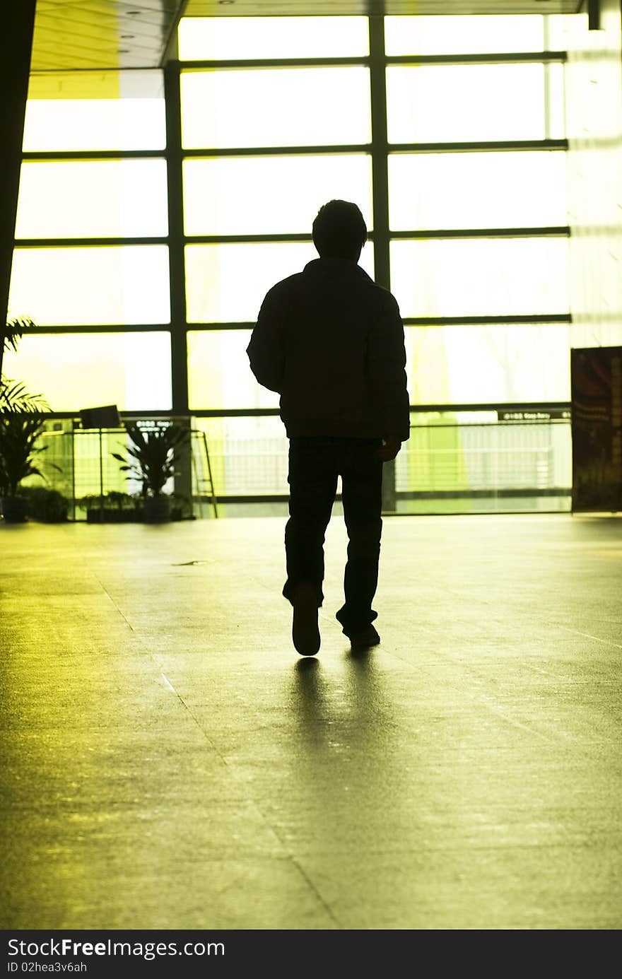 People Silhouettes At Office Building