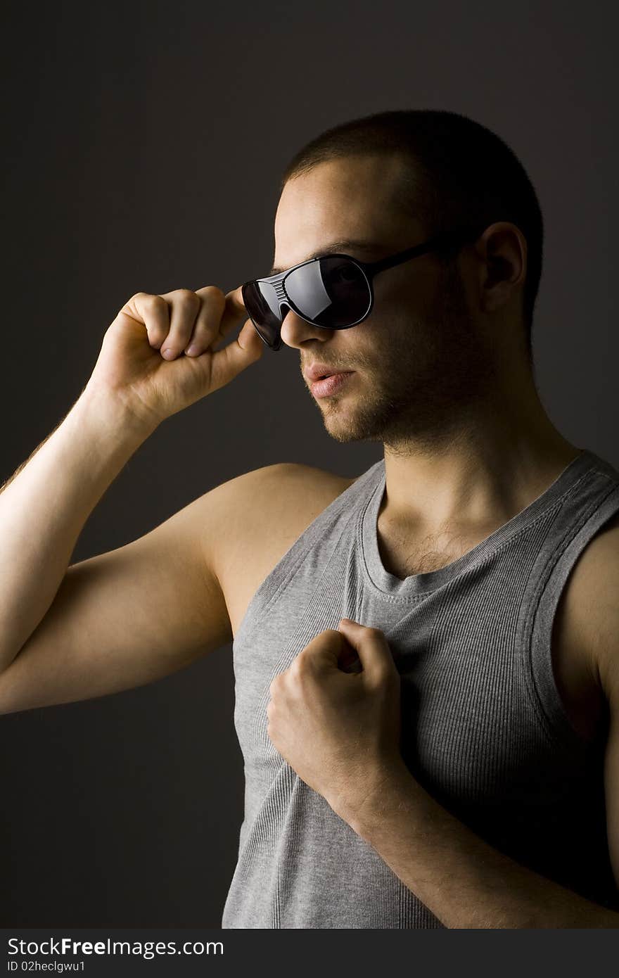 Attractive young male model with sunglasses. Attractive young male model with sunglasses