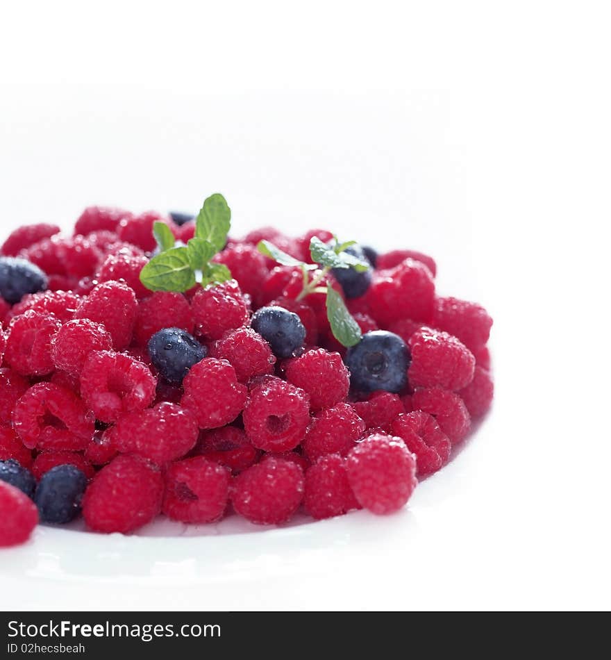 Wild raspberries and blueberries