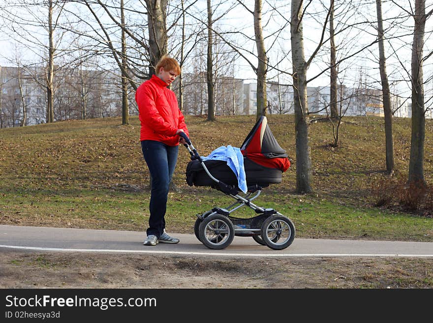 Mother Walking In The Park