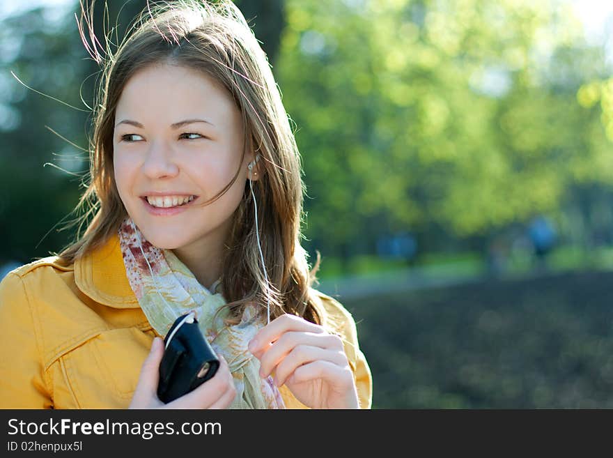 Young woman listening music