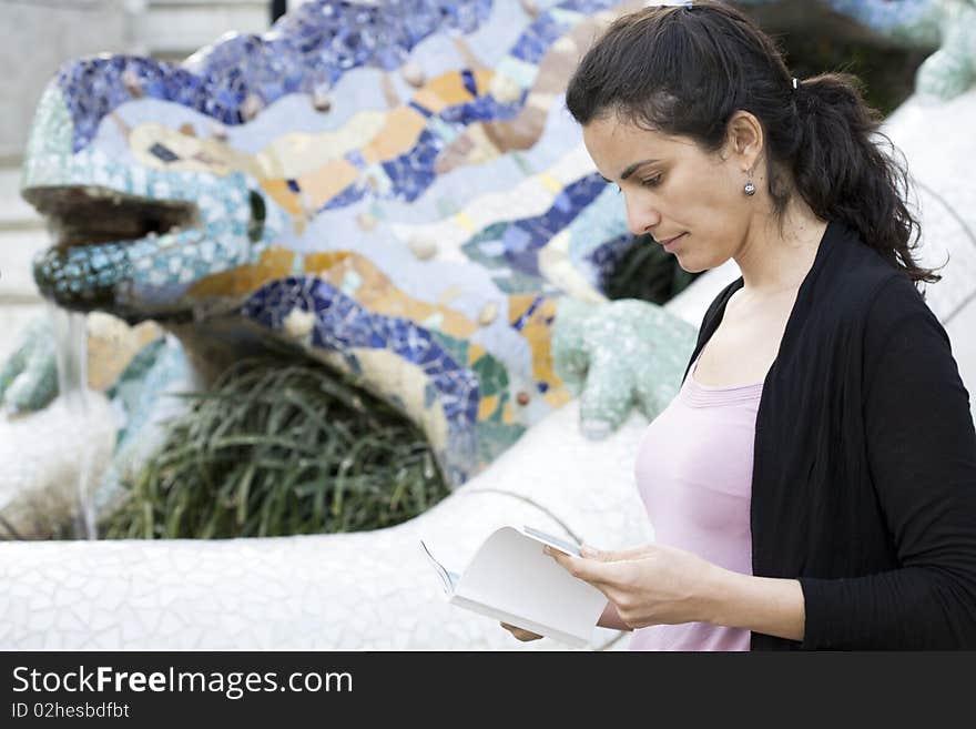 Woman visiting Parc Guell in Barcelona. Woman visiting Parc Guell in Barcelona