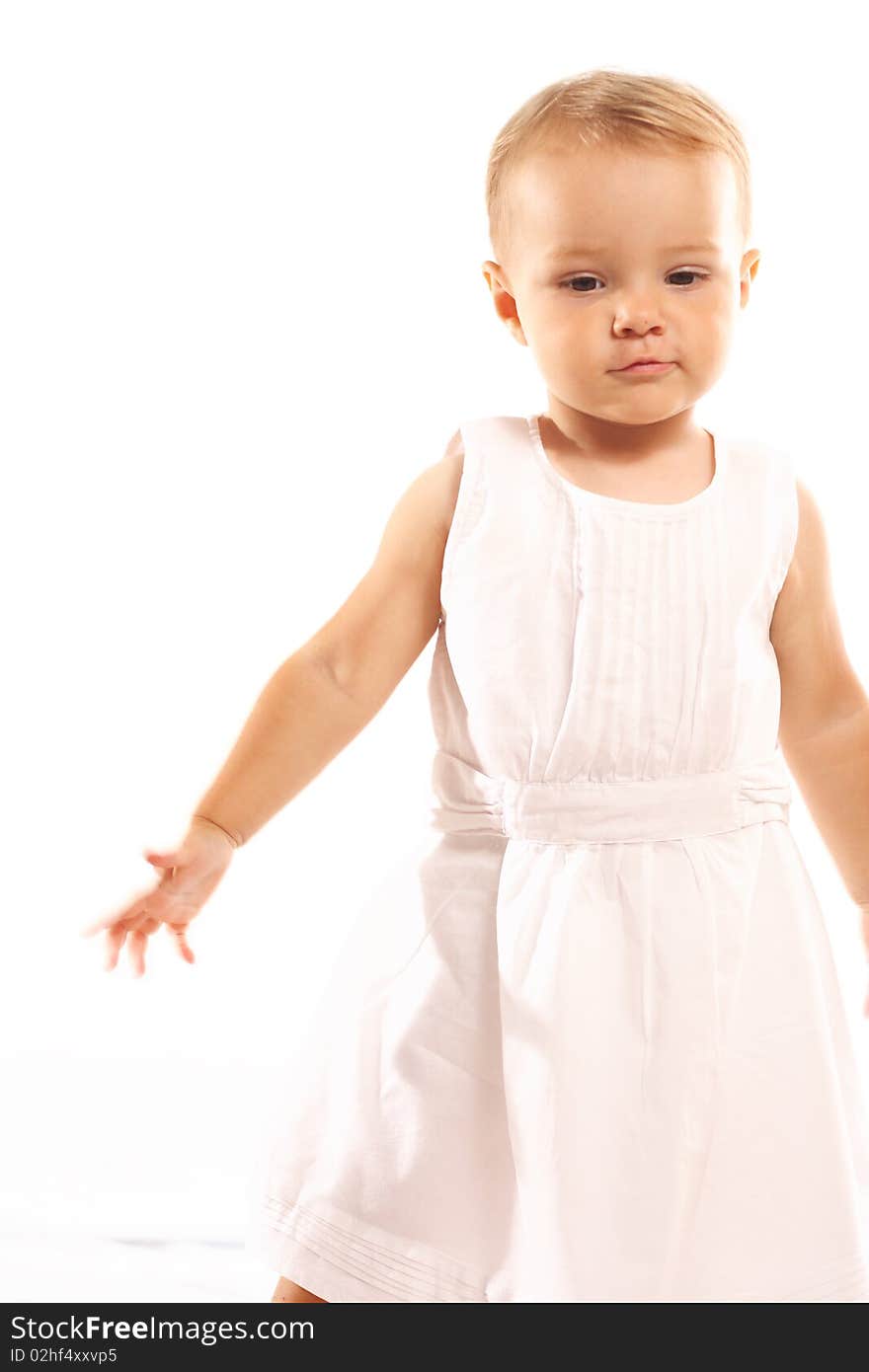 Thoughtful baby girl on white background