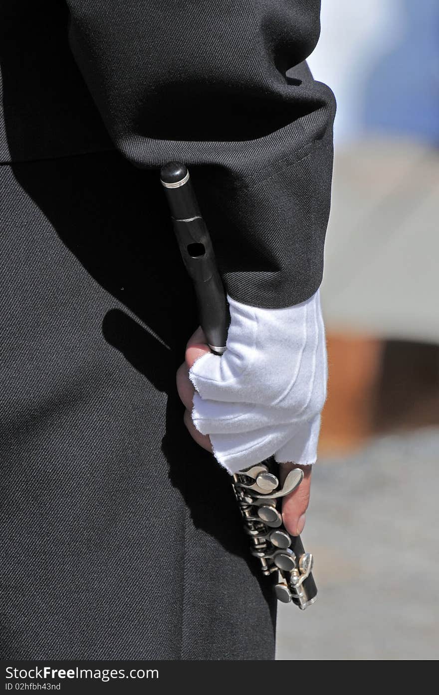 Detail of a musician with flute