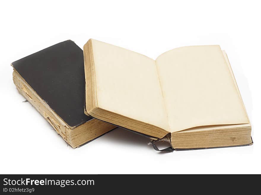 Antique black book, one closed, one opened (blank) and ready for your text/image. Antique black book, one closed, one opened (blank) and ready for your text/image
