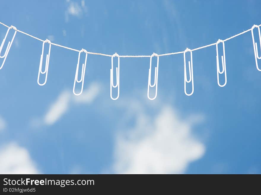 Paper Clips on a rope with a note