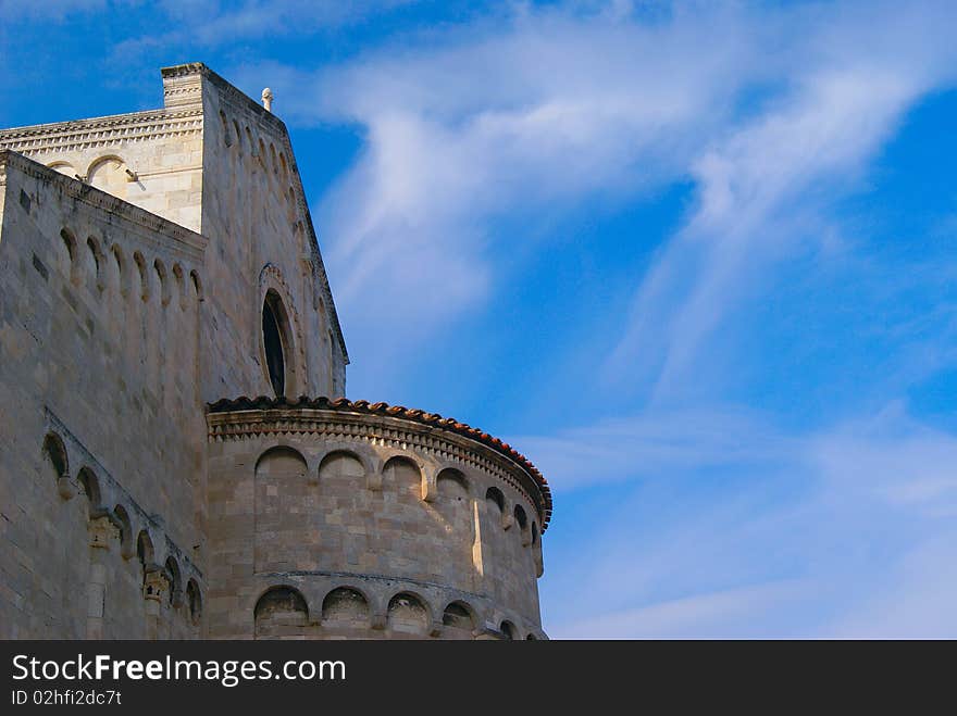 Old  cathedral tower under sky blue