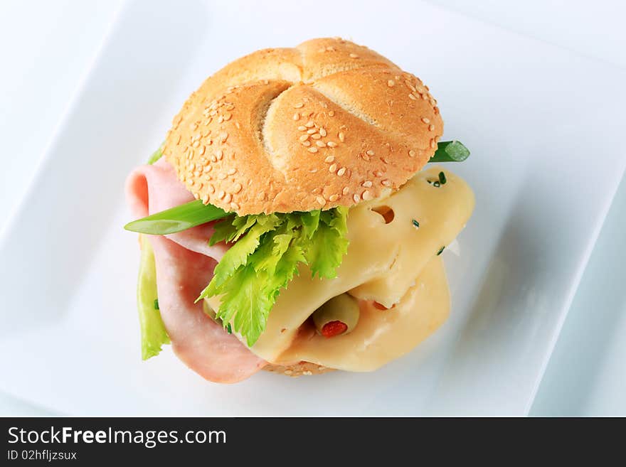 Ham and cheese sandwich on a square plate